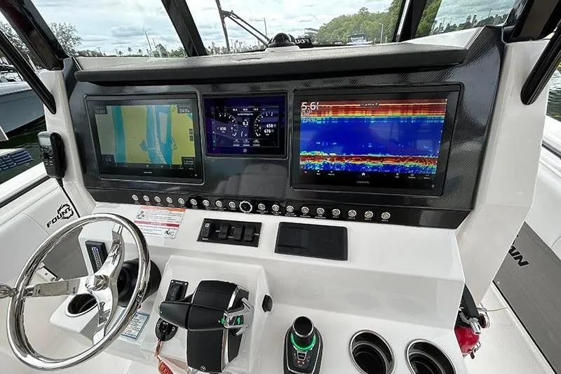  Yacht Photos Pics 2025 Fountain 38 Center Console dashboard with advanced navigation and control systems.