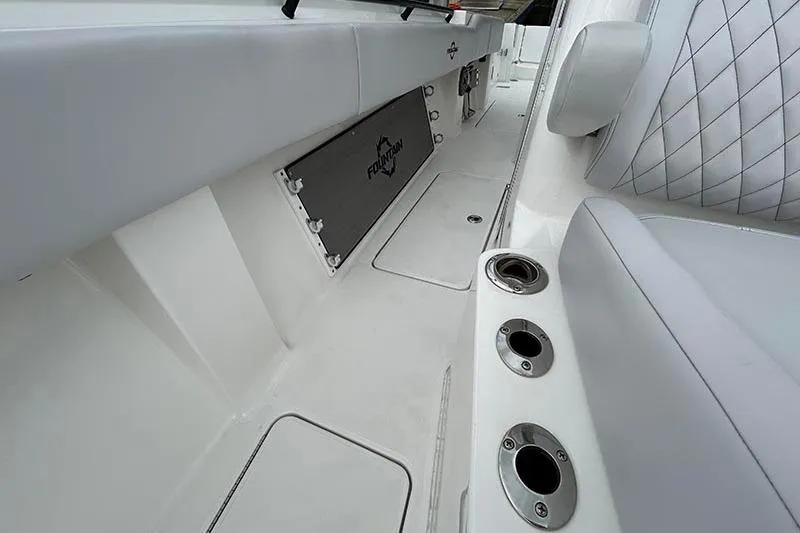  Yacht Photos Pics 2025 Fountain 38 Center Console interior with sleek seating and storage compartments.