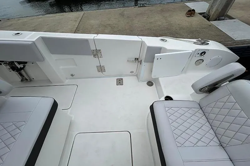  Yacht Photos Pics 2025 Fountain 38 Center Console boat interior with white seating and deck.