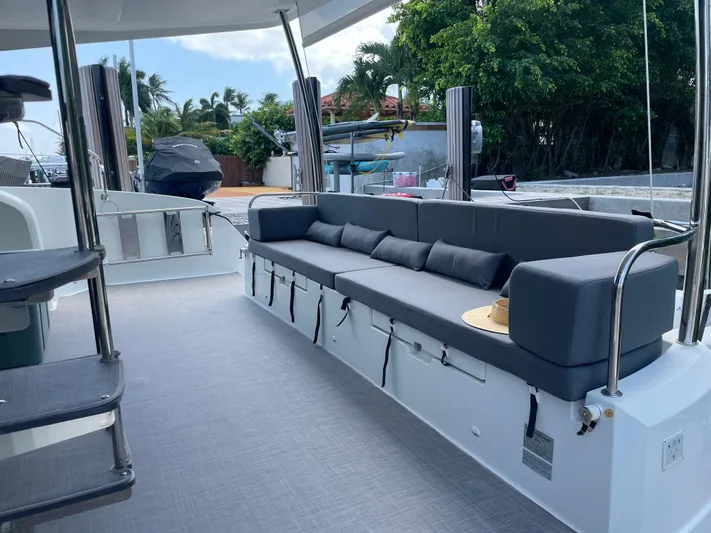 Fina Yacht Photos Pics Spacious deck of 2020 Fountaine Pajot MY 44 with comfortable seating and modern design.