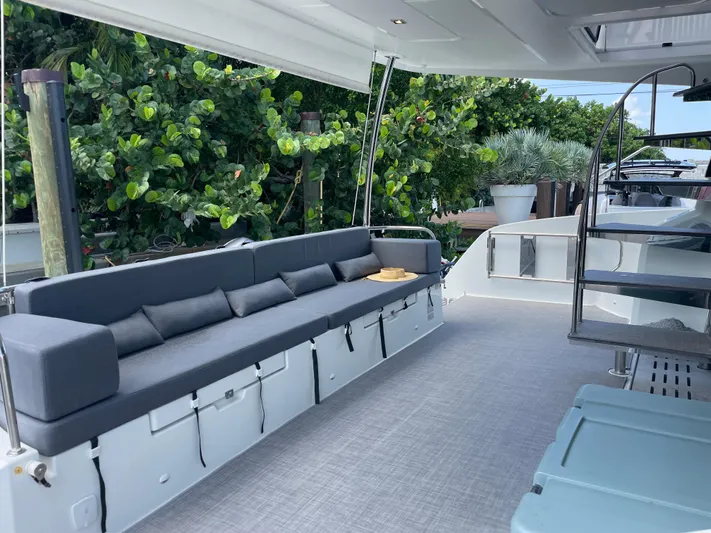 Fina Yacht Photos Pics Spacious deck of 2020 Fountaine Pajot MY 44 yacht with comfortable seating.