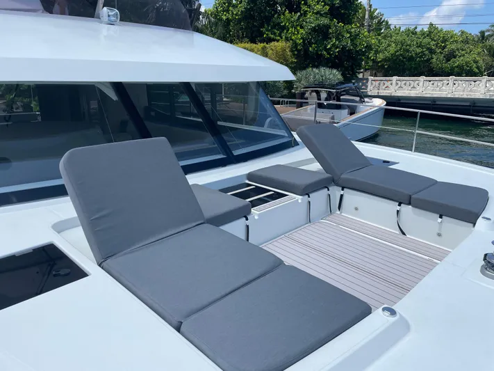 Fina Yacht Photos Pics 2020 Fountaine Pajot MY 44 yacht with sun loungers on deck.