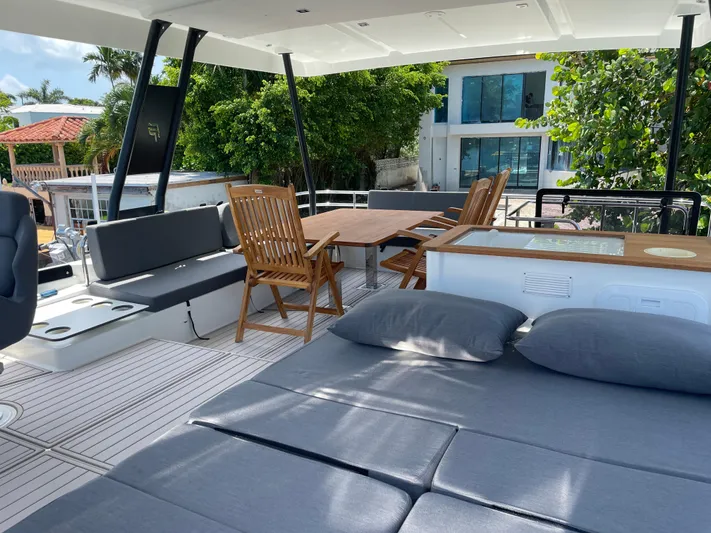 Fina Yacht Photos Pics Luxurious 2020 Fountaine Pajot MY 44 yacht deck with seating and dining area.