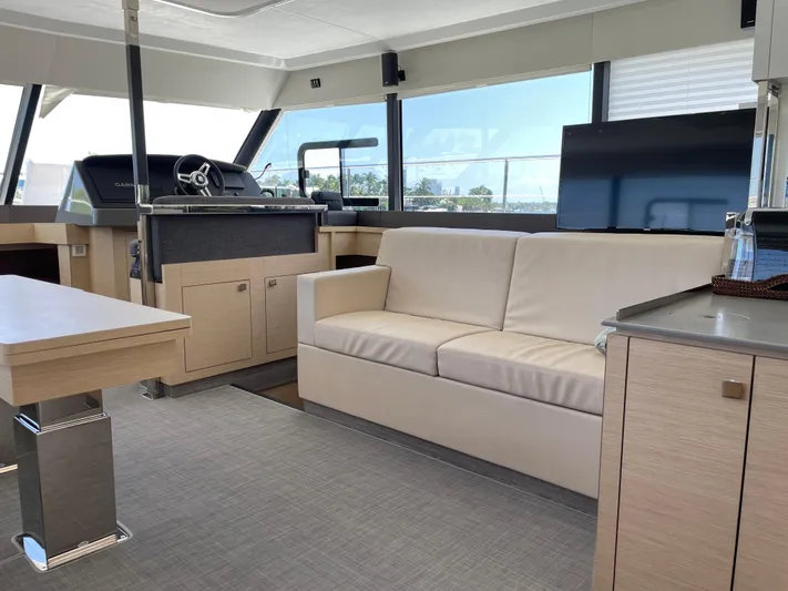 Fina Yacht Photos Pics Interior of 2020 Fountaine Pajot MY 44 yacht with modern furnishings and helm station.