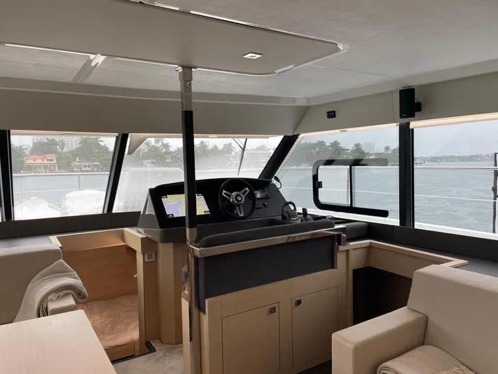 Fina Yacht Photos Pics Interior view of 2020 Fountaine Pajot MY 44 yacht helm with panoramic windows.