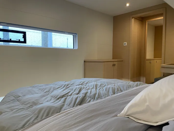 Fina Yacht Photos Pics Luxurious bedroom interior of 2020 Fountaine Pajot MY 44 yacht with modern design.