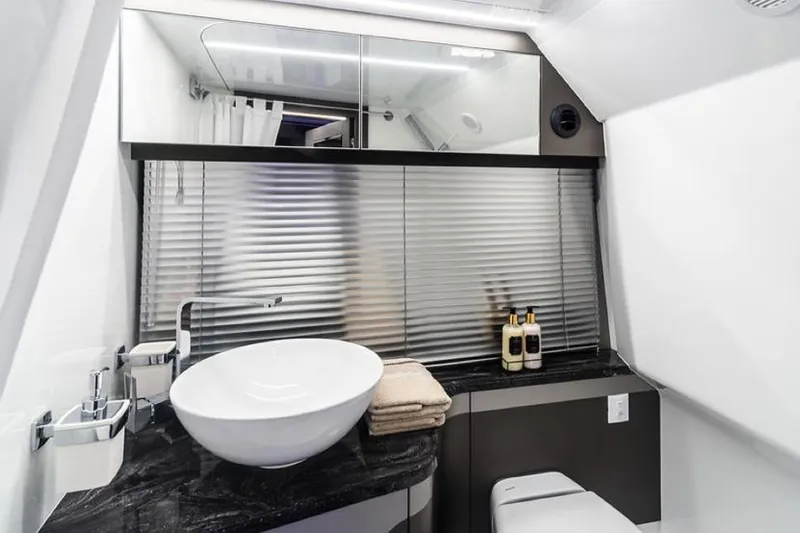  Yacht Photos Pics Manufacturer Provided Image: Modern bathroom in 2024 Galeon 325 GTO yacht with sleek fixtures and elegant design.