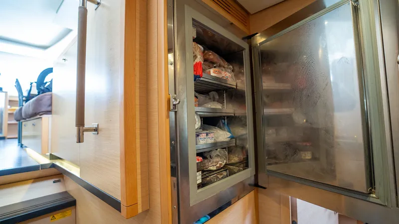 Respite At Sea Yacht Photos Pics Extra Freezer in Starboard Companionway