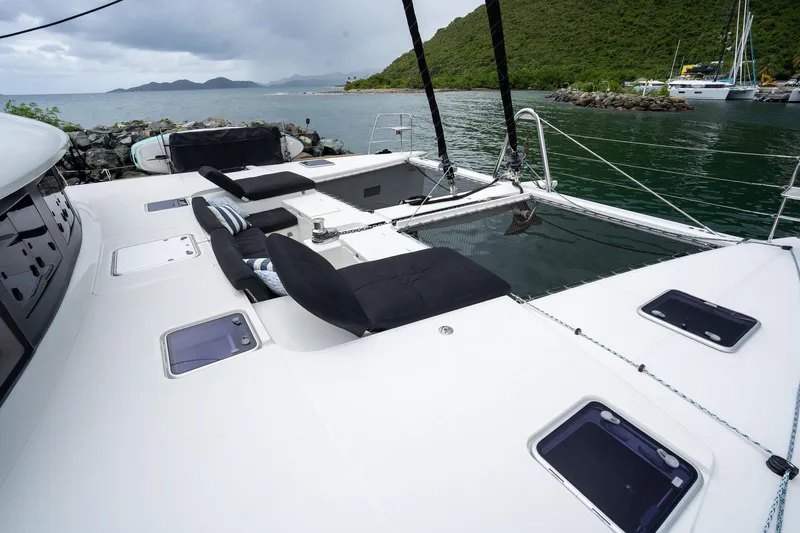 Respite At Sea Yacht Photos Pics Foredeck with Custom Trampolines, Cockpit Seating and 2 Sunlounger Day Beds