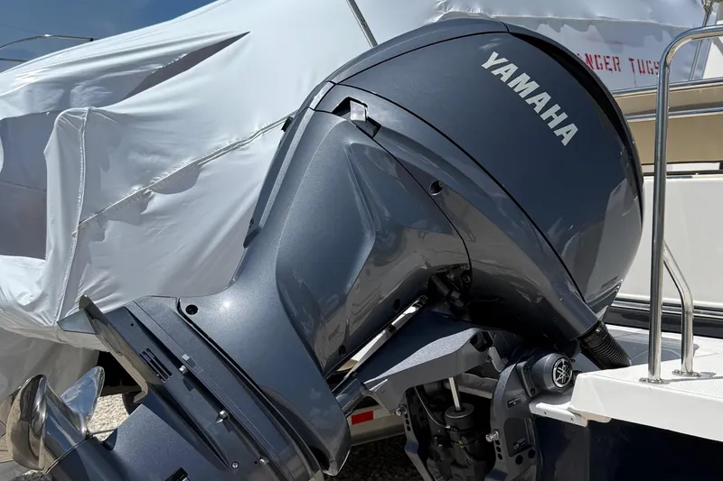  Yacht Photos Pics Yamaha outboard motor on 2025 Ranger Tugs R-23 boat, partially covered.
