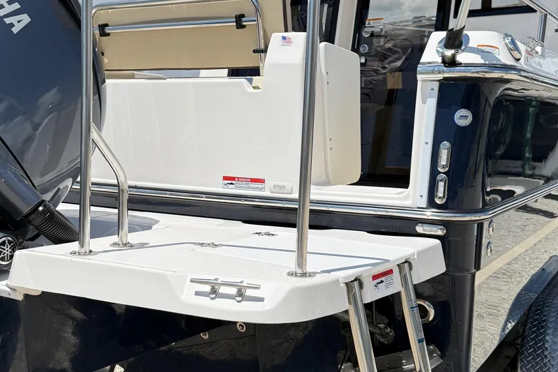  Yacht Photos Pics 2025 Ranger Tugs R-23 boat stern with swim platform and ladder.