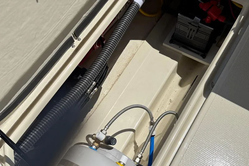  Yacht Photos Pics Interior view of 2025 Ranger Tugs R-23 boat showing mechanical components and wiring.