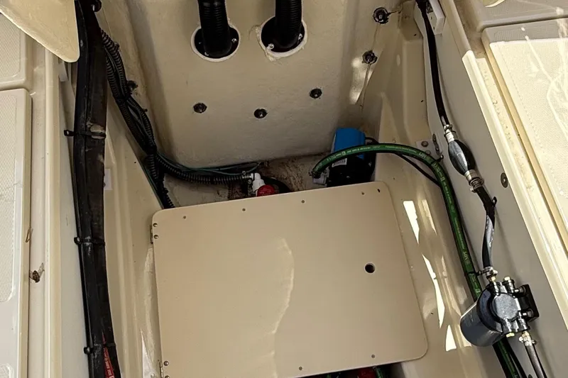  Yacht Photos Pics 2025 Ranger Tugs R-23 boat interior showing engine compartment and wiring.
