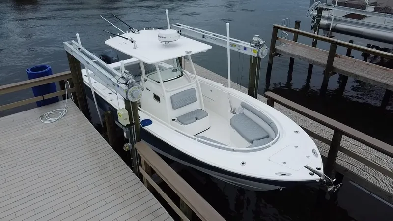  Yacht Photos Pics 2007 Edgewater 318CC boat docked at marina, aerial view.