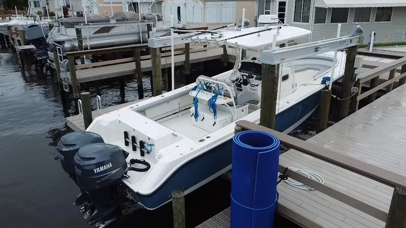  Yacht Photos Pics 2007 Edgewater 318CC boat docked with twin Yamaha engines.