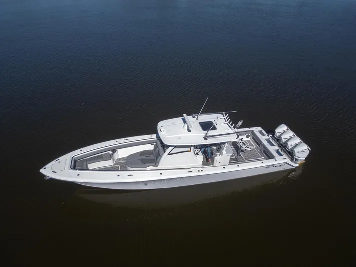 Grey Goose Yacht Photos Pics 2020 Blackwater 43 Sportfish boat on calm water, aerial view.