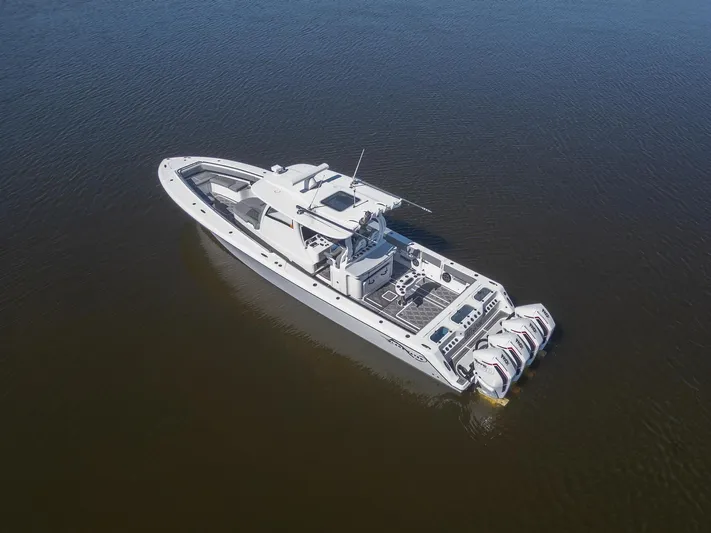 Grey Goose Yacht Photos Pics 2020 Blackwater 43 Sportfish boat on calm water, aerial view.