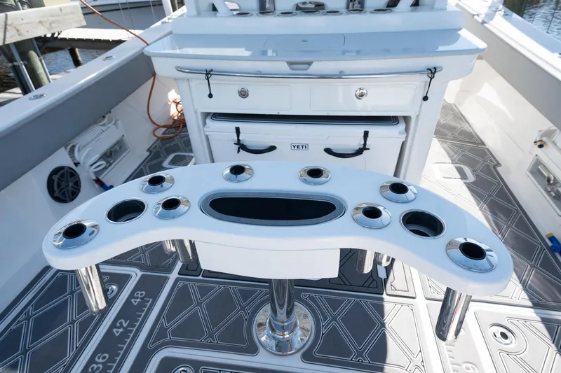 Grey Goose Yacht Photos Pics 2020 Blackwater 43 Sportfish boat deck with rod holders and storage.