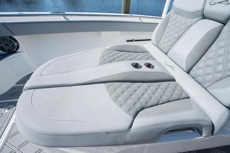 Grey Goose Yacht Photos Pics Luxurious seating on 2020 Blackwater 43 Sportfish boat with quilted design and cup holders.
