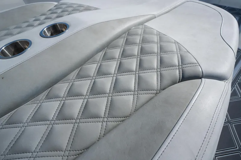 Grey Goose Yacht Photos Pics Luxurious quilted leather seating on 2020 Blackwater 43 Sportfish boat with cup holders.