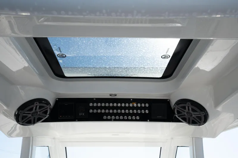 Grey Goose Yacht Photos Pics 2020 Blackwater 43 Sportfish interior with skylight and speaker system.