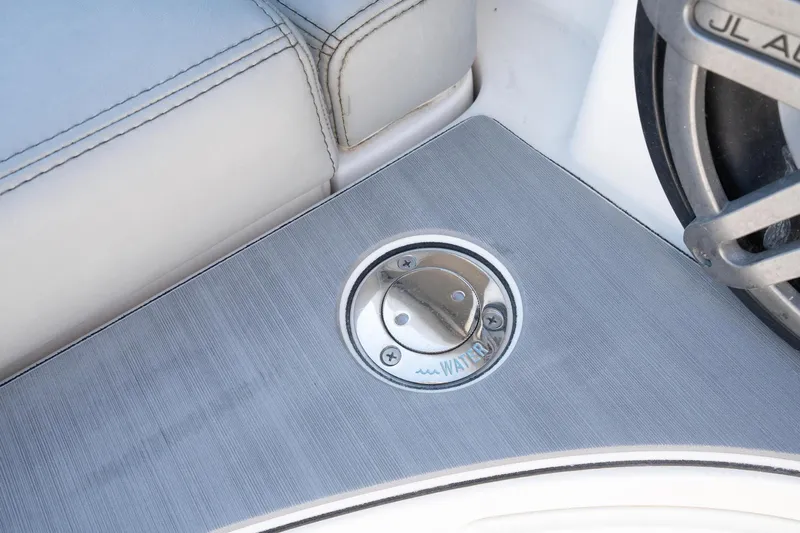 Grey Goose Yacht Photos Pics Fuel cap on 2020 Blackwater 43 Sportfish boat deck, near seating area.