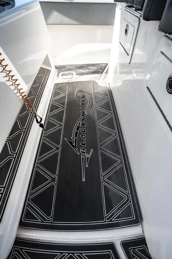 Grey Goose Yacht Photos Pics Blackwater 43 Sportfish 2020 boat deck with custom Blackwater logo mat.