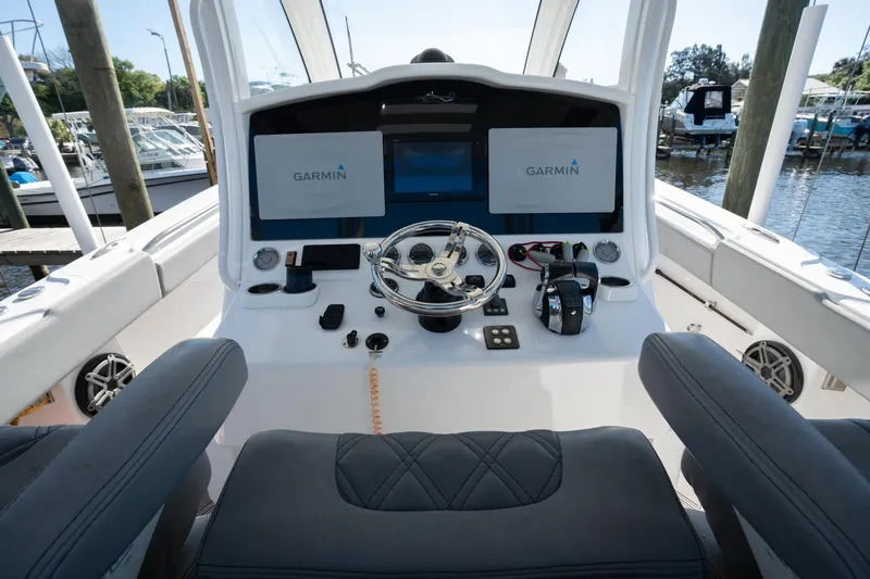 Grey Goose Yacht Photos Pics 2020 Blackwater 43 Sportfish boat helm with Garmin displays and modern controls.