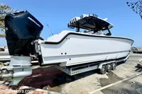 2025 Catamaran 47 Offshore on trailer, featuring powerful Mercury outboard engine.