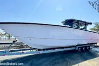2025 Catamaran 47 Offshore on trailer, displayed outdoors under clear sky.