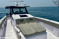 2025 Catamaran 47 Offshore Catamaran cruising on open sea, featuring luxurious seating.