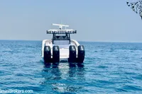2025 Catamaran 47 Offshore Catamaran on open sea, featuring four powerful engines.