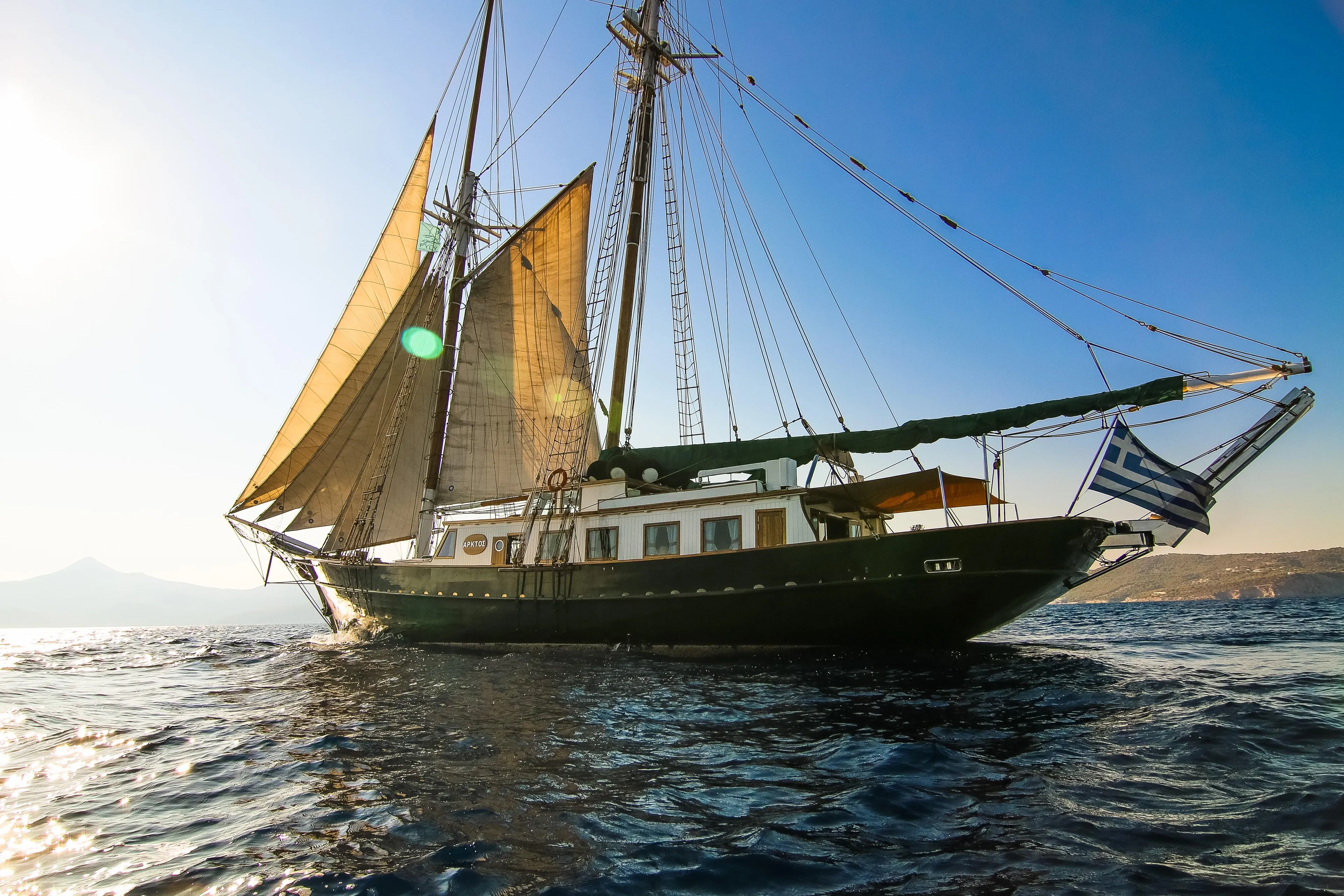 Sailing ship with full sails on open water, custom model, 2004.
