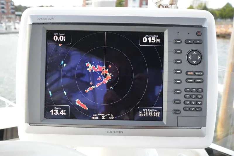 Piper Yacht Photos Pics Garmin GPS display on 2007 Jeanneau Prestige 46 yacht, showing navigation data and radar.