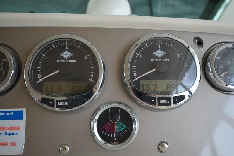 Piper Yacht Photos Pics Dashboard of a 2007 Jeanneau Prestige 46 yacht showing RPM and voltage gauges.