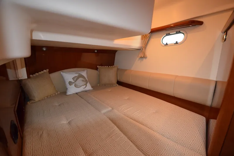 Piper Yacht Photos Pics Luxurious cabin interior of 2007 Jeanneau Prestige 46 yacht with cozy bedding.
