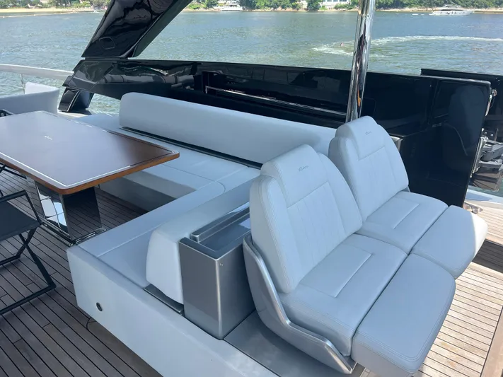 Hk 007 Yacht Photos Pics Luxurious seating area on 2024 Riva 102' Corsaro Super yacht, featuring elegant design and waterfront view.