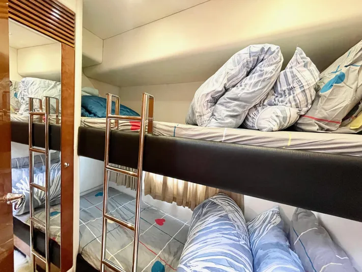Ellyn Yacht Photos Pics Bunk beds in 2010 Sunseeker Manhattan 70 yacht cabin with cozy bedding.