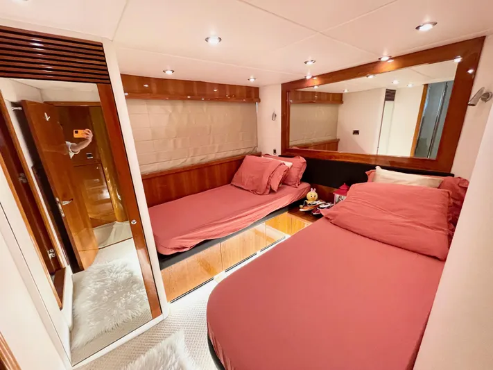 Ellyn Yacht Photos Pics Luxurious cabin interior of 2010 Sunseeker Manhattan 70 yacht with twin beds.