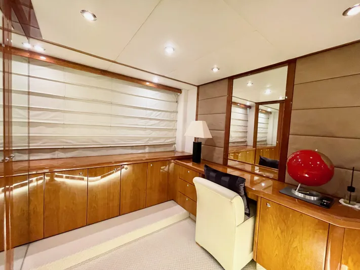 Ellyn Yacht Photos Pics Luxurious interior of 2010 Sunseeker Manhattan 70 yacht with elegant wood finishes and modern decor.