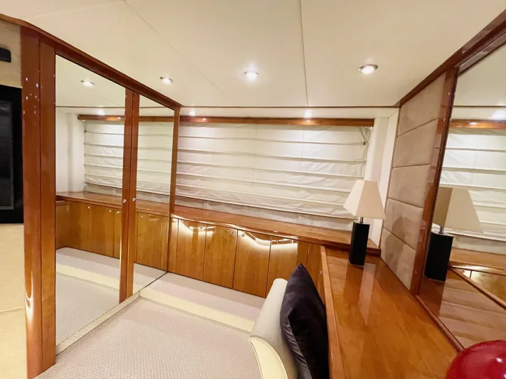Ellyn Yacht Photos Pics Luxurious interior of 2010 Sunseeker Manhattan 70 yacht with elegant wood finishes.