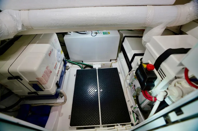 Rhyde Yacht Photos Pics Engine room of 2021 Valhalla Boatworks V46, featuring equipment and piping.
