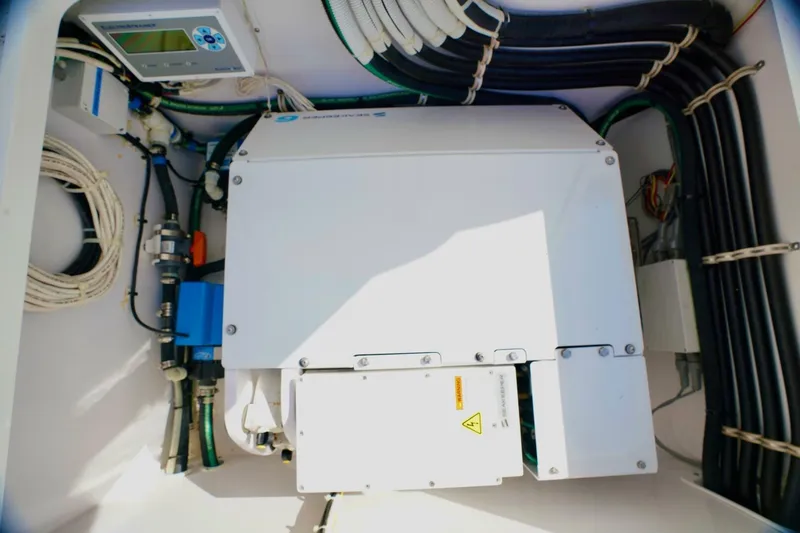 Rhyde Yacht Photos Pics Electrical system inside 2021 Valhalla Boatworks V46, featuring cables and control panel.