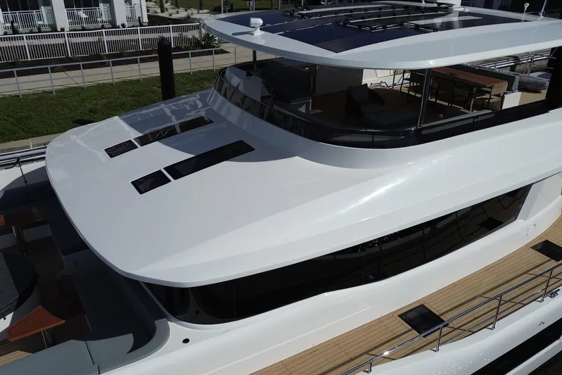 Paso Doble Yacht Photos Pics Luxurious 2025 Granocean W72 yacht with sleek design and spacious upper deck.