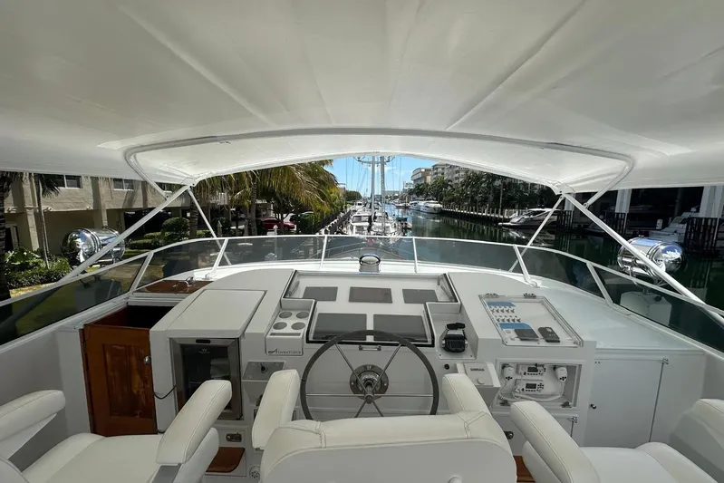 Adventurer Yacht Photos Pics Cockpit view of a 1985 Burger 94 yacht docked in a marina.