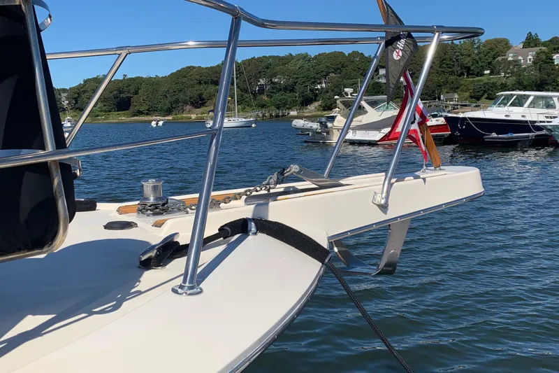 Sea Trial Yacht Photos Pics Bow of 1991 Hatteras 40 Motor Yacht docked in a scenic marina.