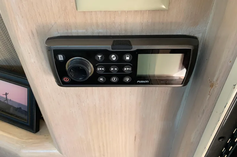 Sea Trial Yacht Photos Pics Fusion audio system on 1991 Hatteras 40 Motor Yacht interior wall.