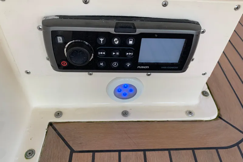 Sea Trial Yacht Photos Pics Control panel on 1991 Hatteras 40 Motor Yacht with Fusion MS-CD600 stereo system.