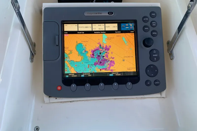 Sea Trial Yacht Photos Pics Navigation system on 1991 Hatteras 40 Motor Yacht displaying colorful marine chart.