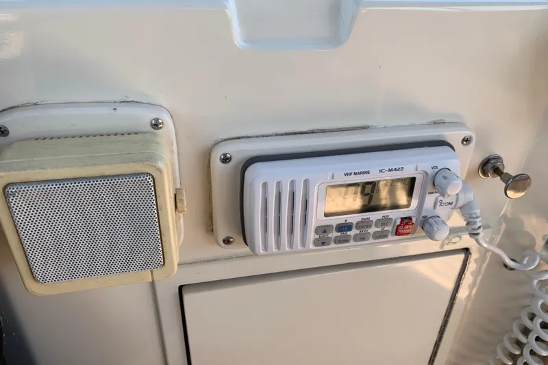 Sea Trial Yacht Photos Pics VHF marine radio on 1991 Hatteras 40 Motor Yacht dashboard.